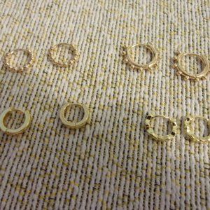 Assorted Huggie Hoop Earrings.